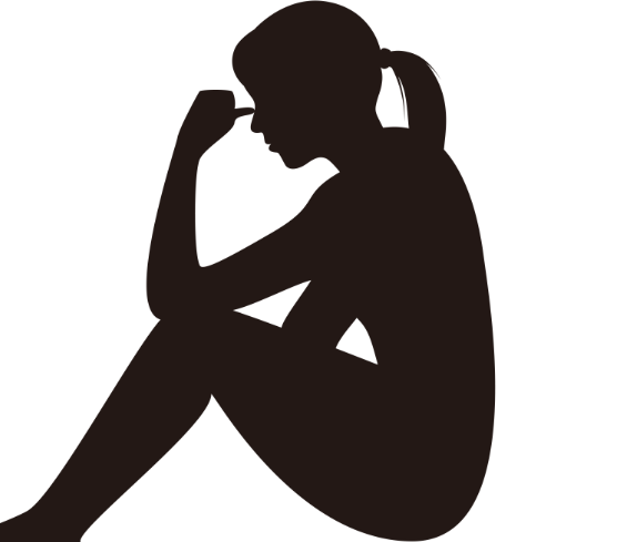 体調不良の女性